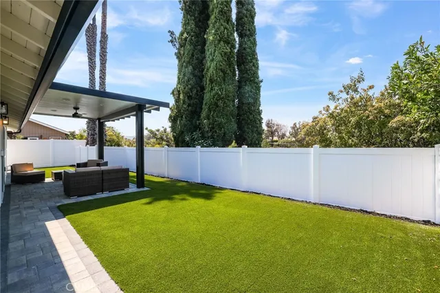 a view of a backyard with a garden