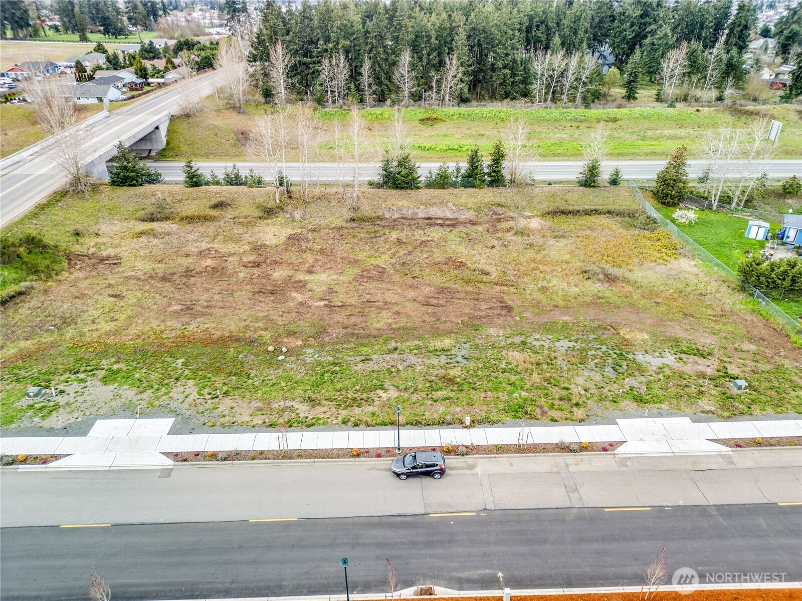 660 McCurdy Road Sequim, WA 98382 - Photo 16 of 22 a view of a swimming pool and a yard