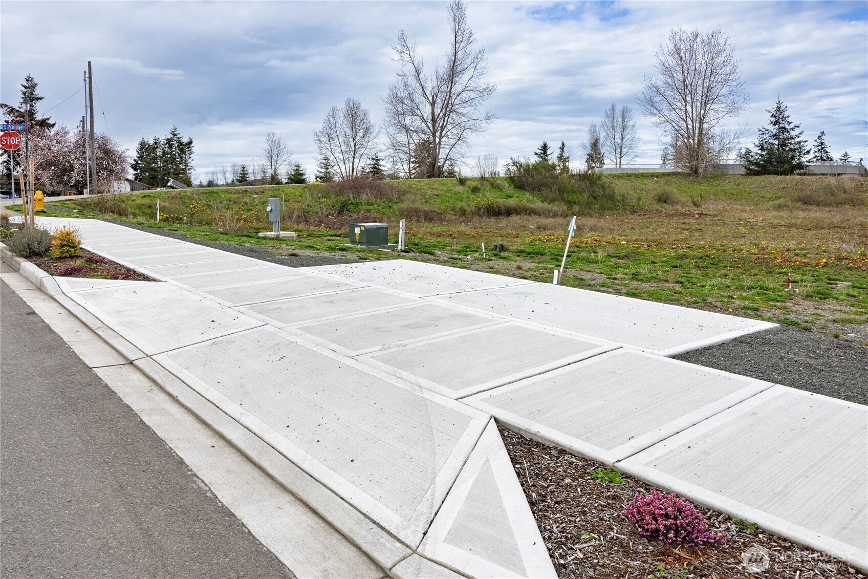 660 McCurdy Road Sequim, WA 98382 - Photo 20 of 22 a view of a street with houses in the background