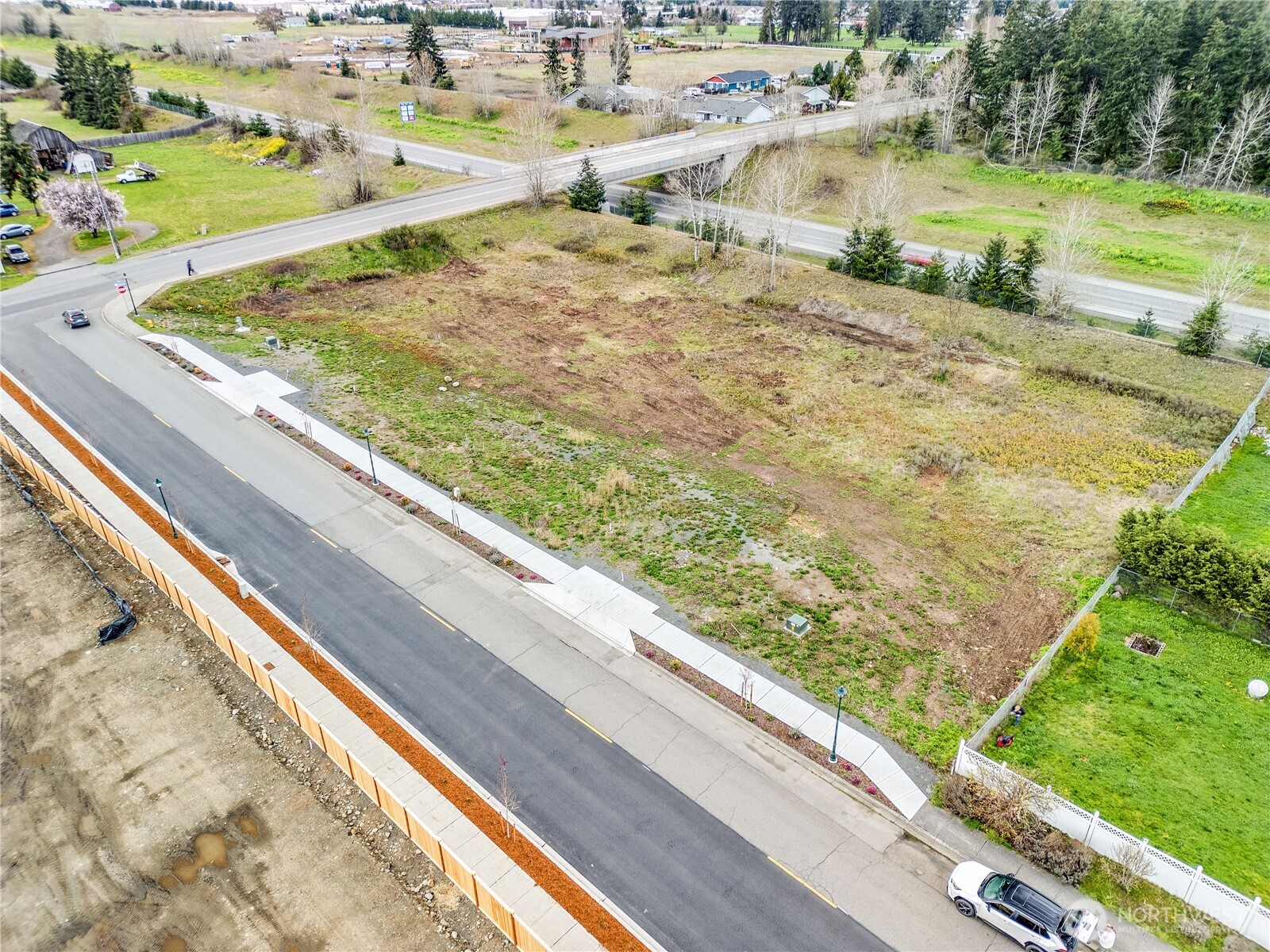 660 McCurdy Road Sequim, WA 98382 - Photo 3 of 22 a view of a swimming pool with a yard