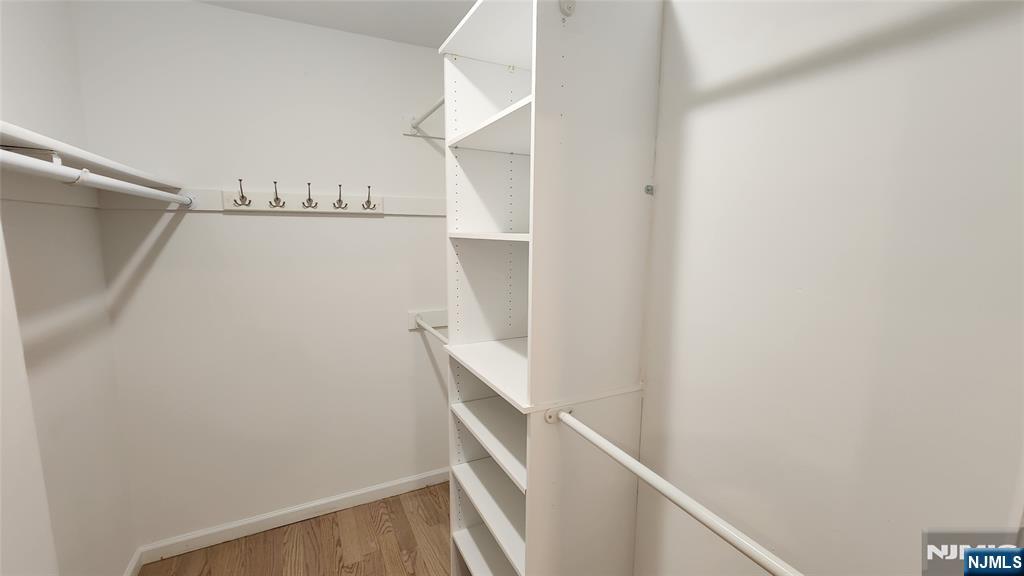 121 Broadway Cresskill, NJ 07626 - Photo 11 of 17 a view of staircase with railing and white walls