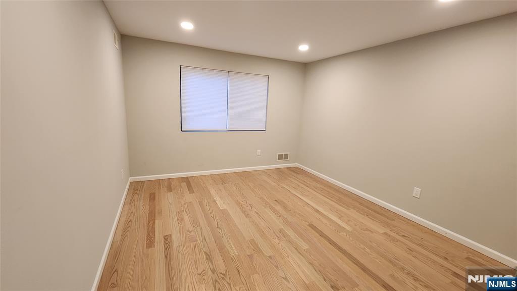 121 Broadway Cresskill, NJ 07626 - Photo 15 of 17 a view of empty room with wooden floor