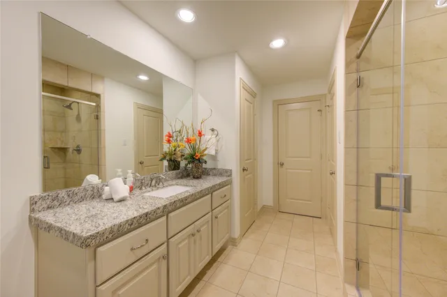 a view of a house with wooden fence