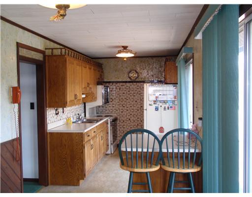 255 Limerick Road Herminie, PA 15637 - Photo 3 of 6 Kitchen. Oak cabinets, 3 door walls to deck, open to dining room, wonderful house to entertain, bring on the BBQ s!