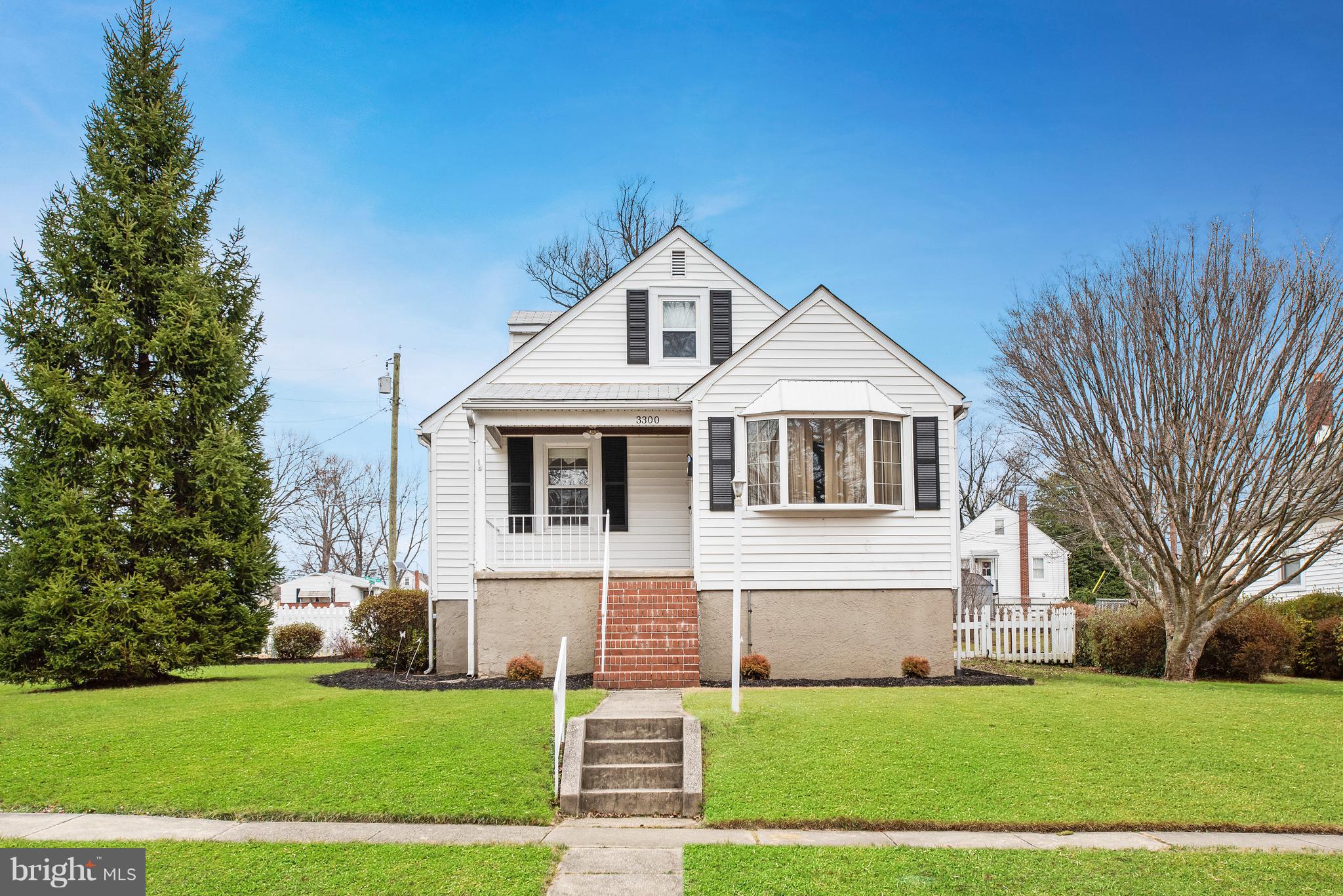 3300 Garnet Road Baltimore, MD 21234 - Photo 1 of 55 a front view of a house with a yard