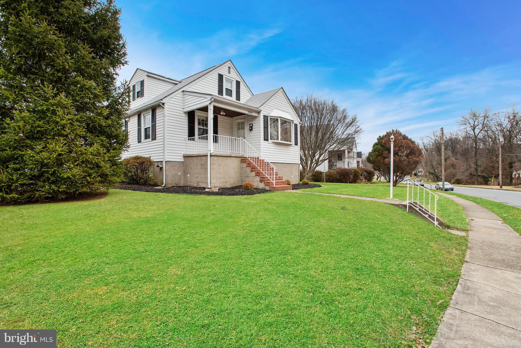 3300 Garnet Road Baltimore, MD 21234 - Photo 2 of 55 a view of a house with a big yard and potted plants