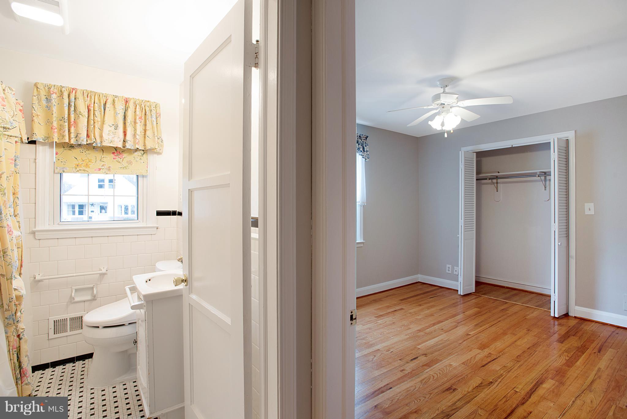 3300 Garnet Road Baltimore, MD 21234 - Photo 19 of 55 a bathroom with a toilet sink and a mirror