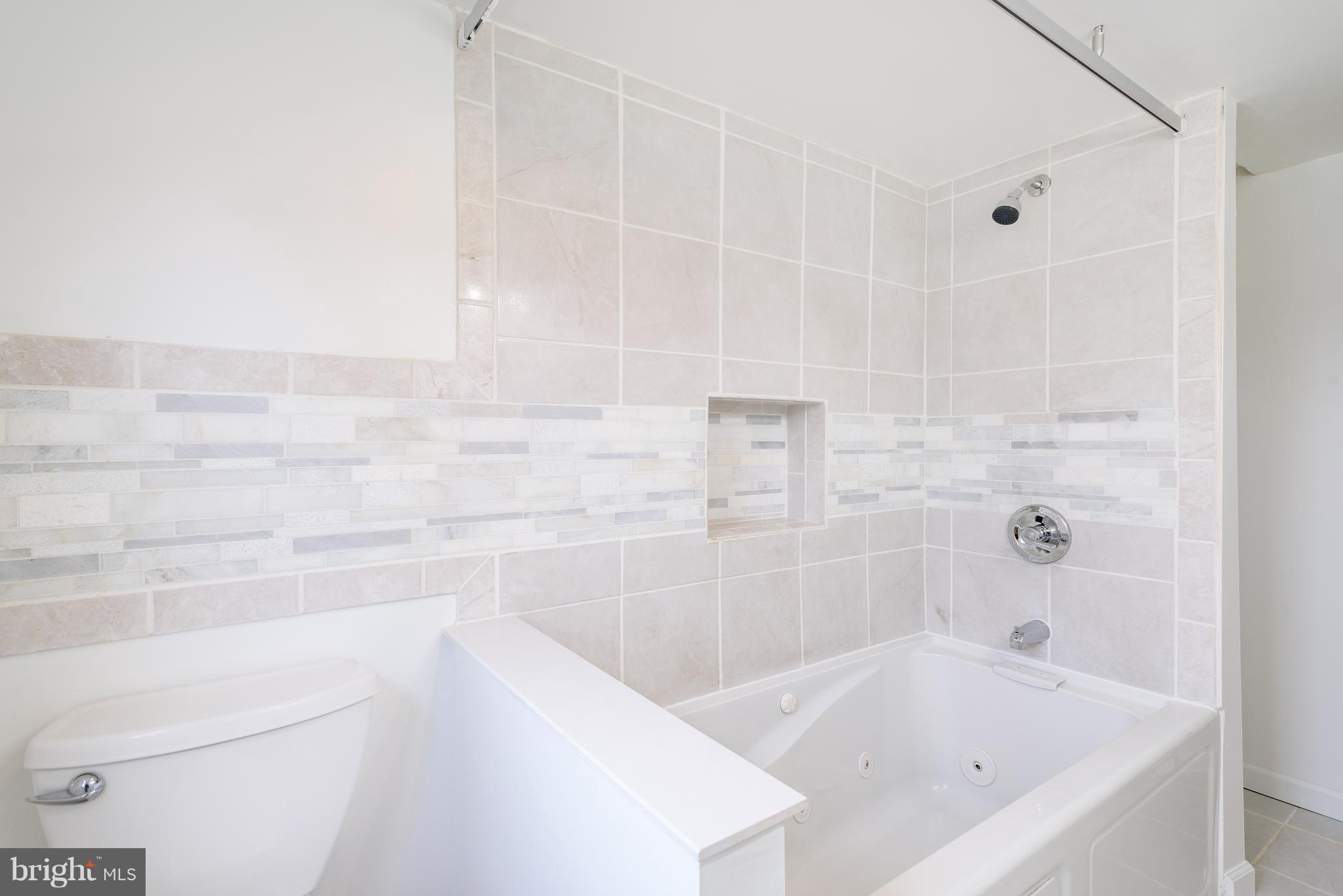3300 Garnet Road Baltimore, MD 21234 - Photo 25 of 55 a bathroom with a bathtub