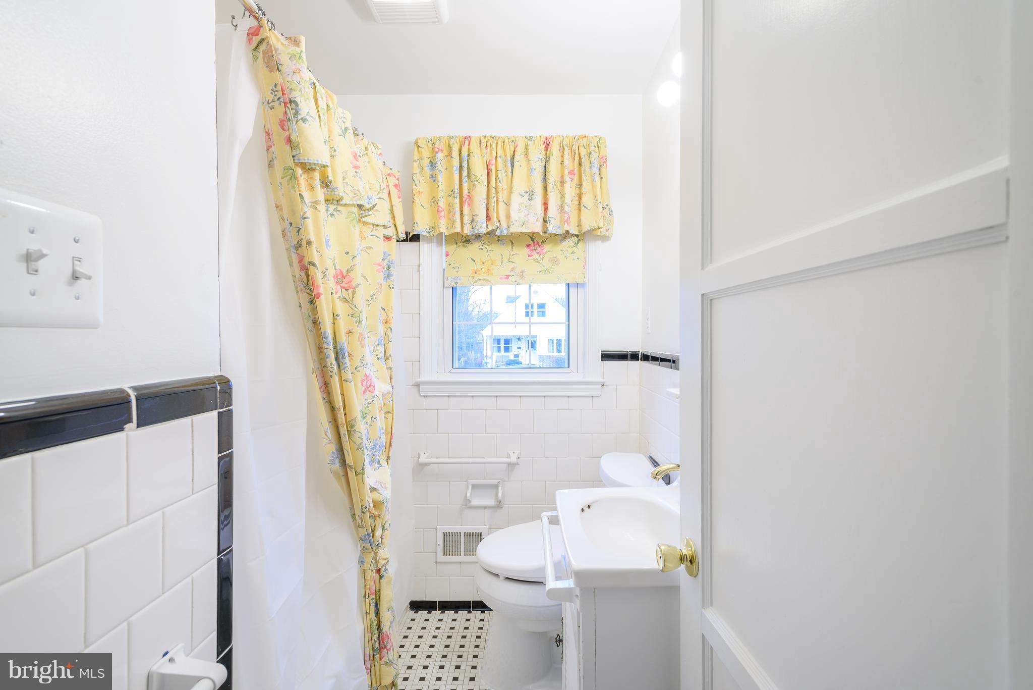 3300 Garnet Road Baltimore, MD 21234 - Photo 46 of 55 a bathroom with a sink toilet and window
