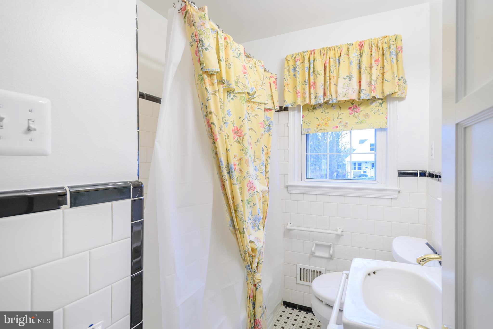 3300 Garnet Road Baltimore, MD 21234 - Photo 47 of 55 a bathroom with a sink and a toilet