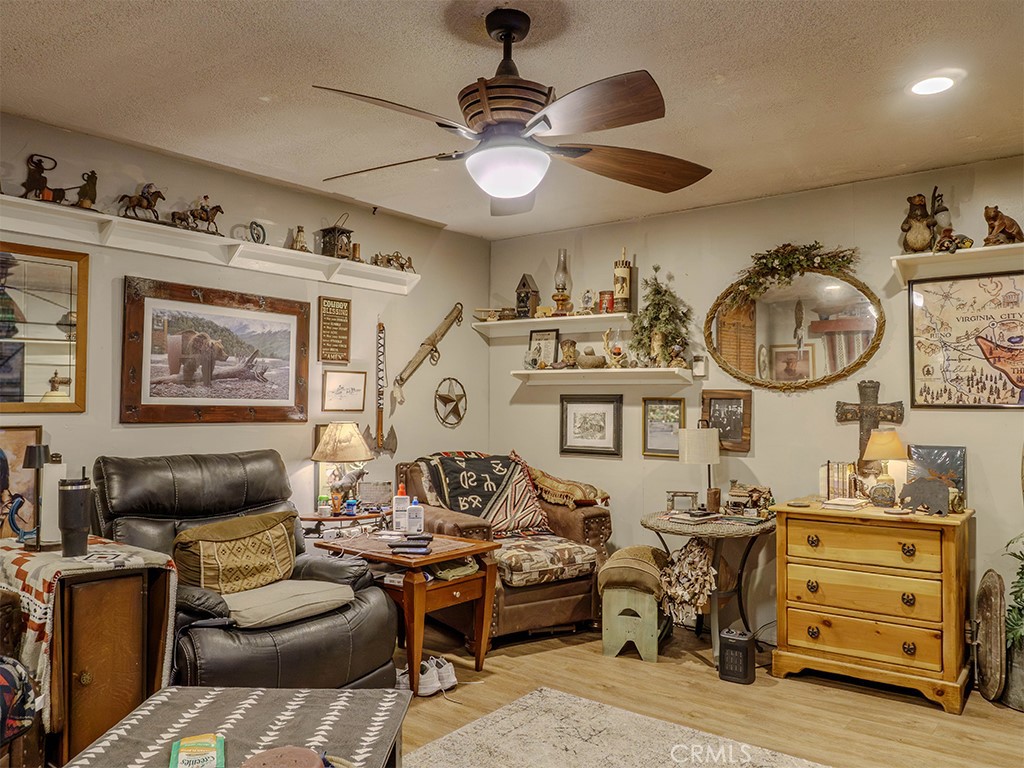 9413 Garfield Street Riverside, CA 92503 - Photo 22 of 33 a living room with furniture and a window