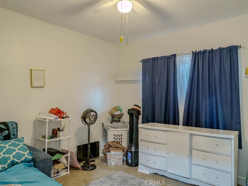 9413 Garfield Street Riverside, CA 92503 - Photo 30 of 33 a view of a room with gym equipment