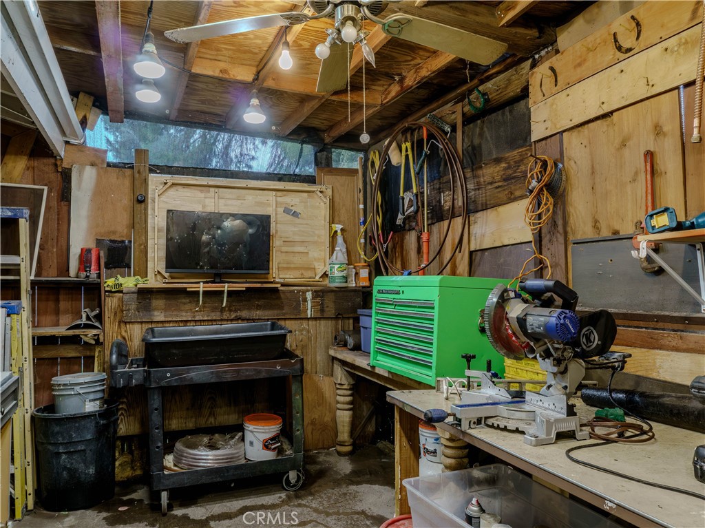 9413 Garfield Street Riverside, CA 92503 - Photo 33 of 33 a room with furniture and a flat screen tv