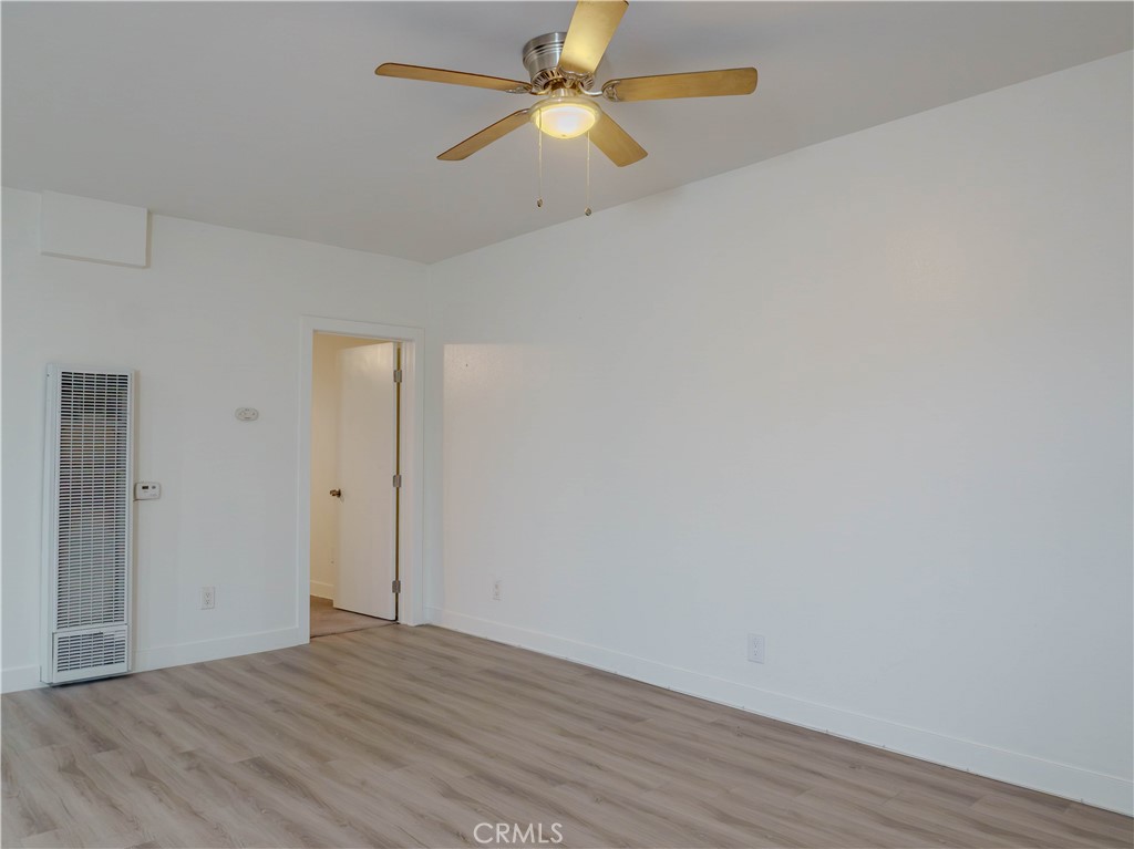 9413 Garfield Street Riverside, CA 92503 - Photo 6 of 33 wooden floor in an empty room