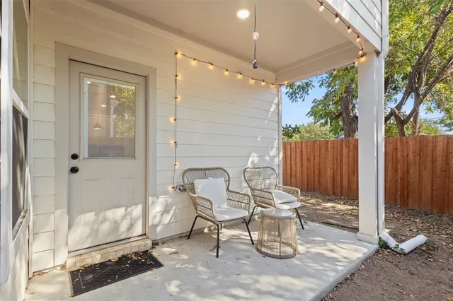 a view of an outdoor space with porch and patio