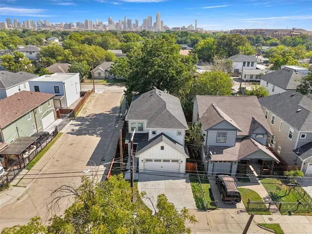 an aerial view of a house with a garden