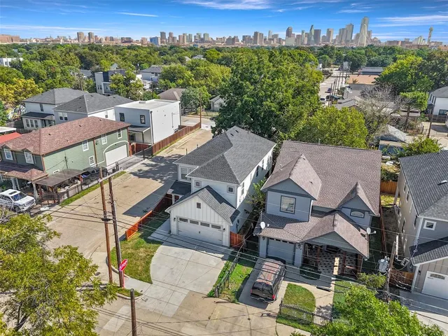 an aerial view of a house with a garden