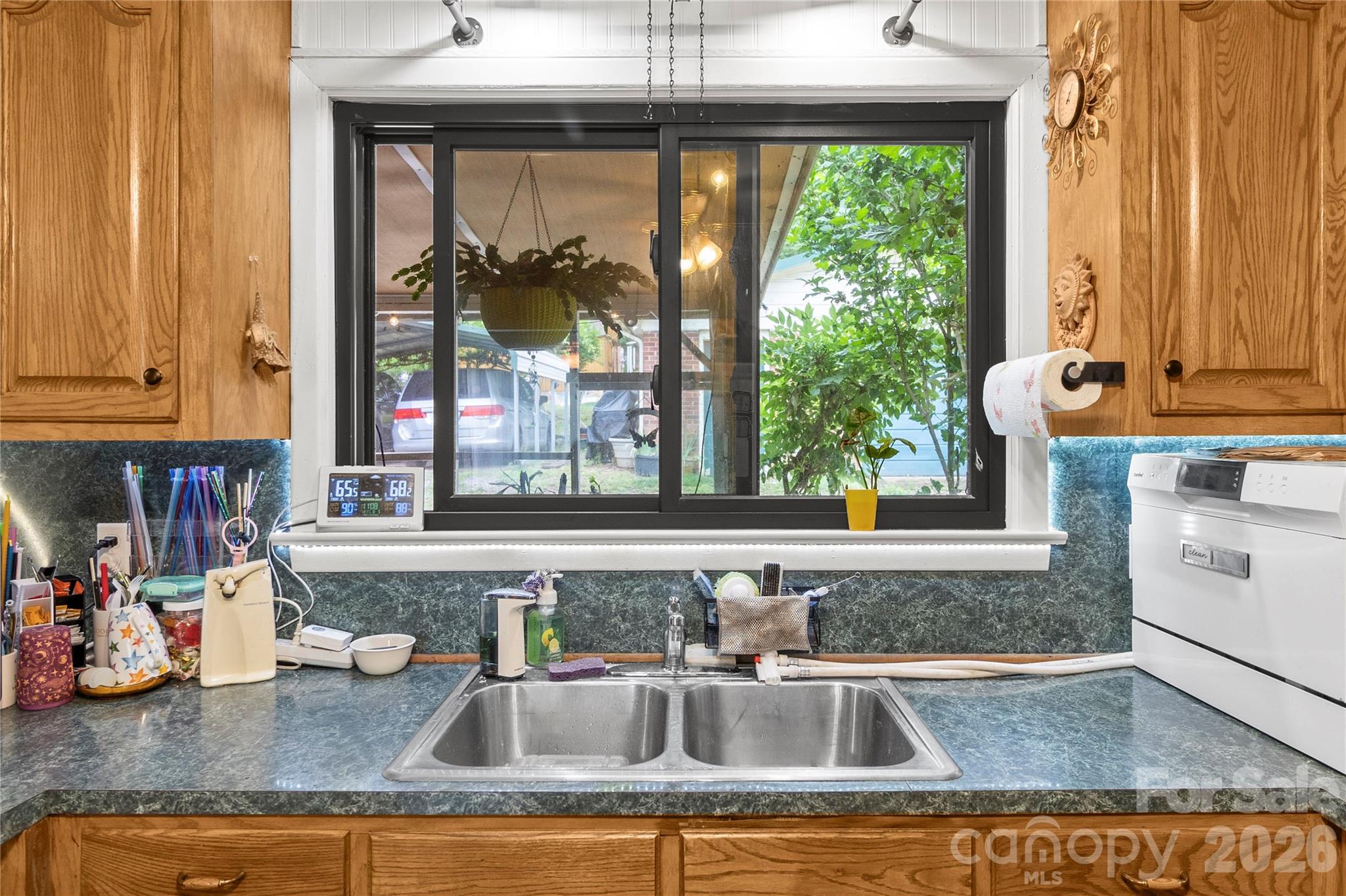 325 Swanson Road Lenoir, NC 28645 - Photo 10 of 35 a kitchen sink with a window