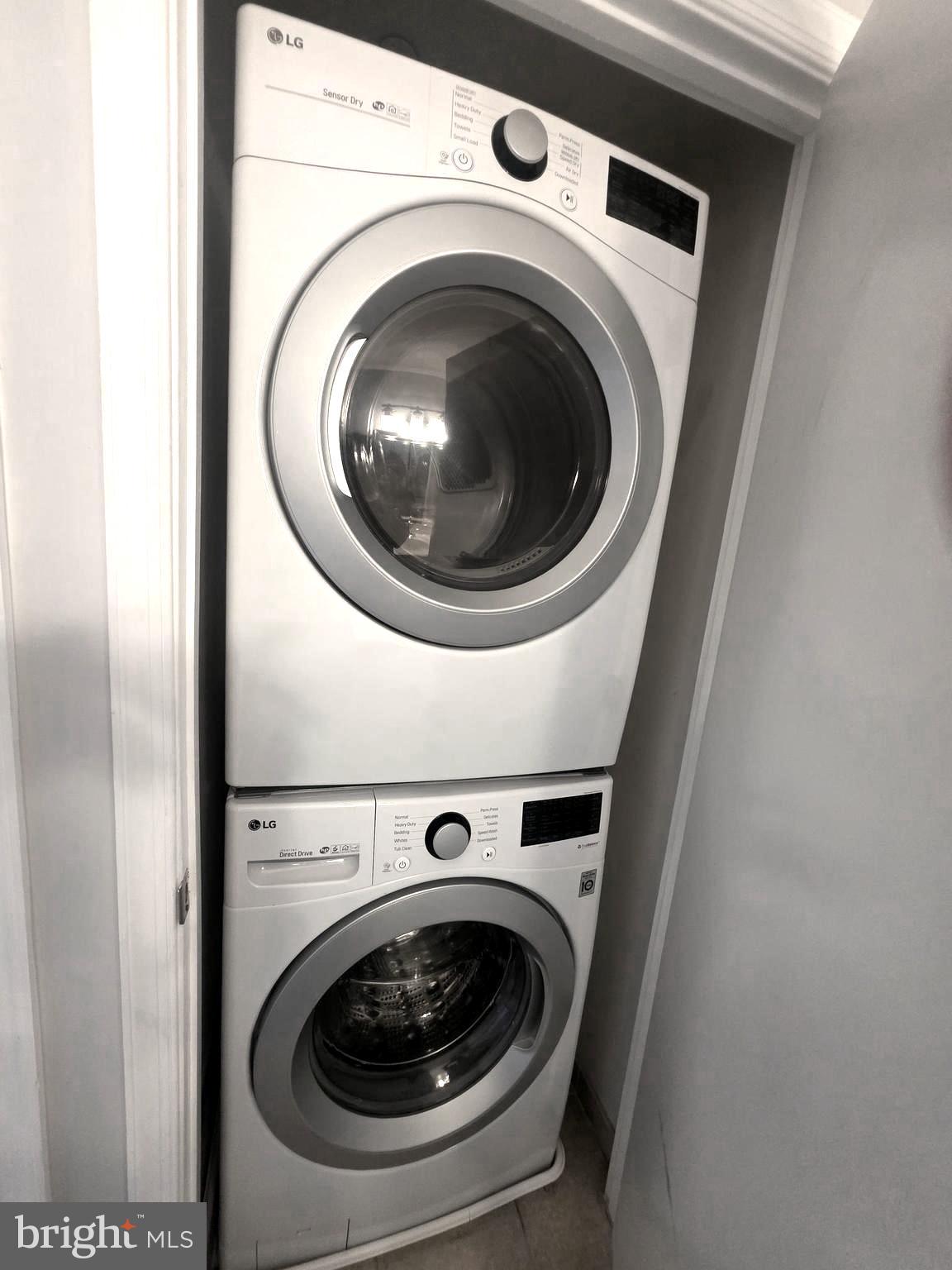 355 I Street Southwest, Unit 501 Washington, DC 20024 - Photo 26 of 44 a utility room with dryer and washer