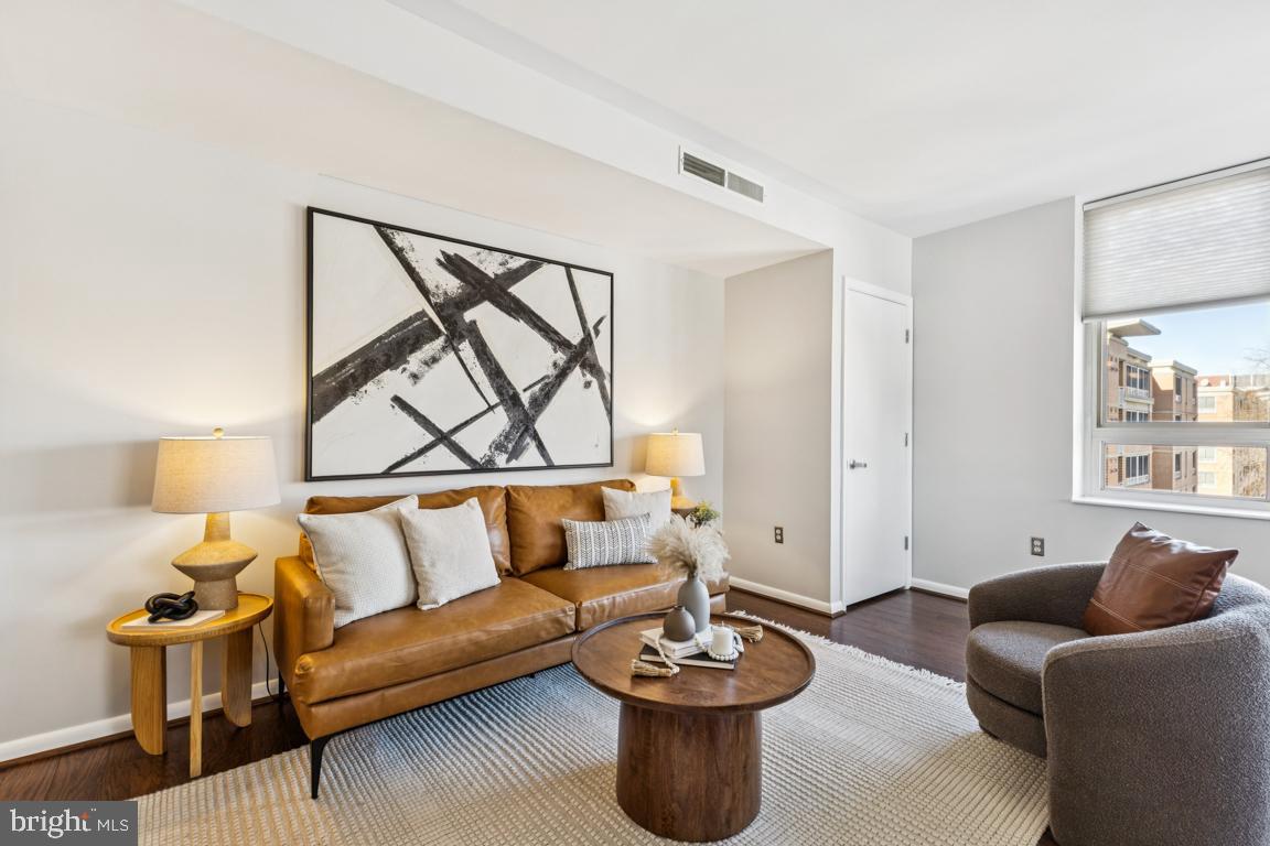 355 I Street Southwest, Unit 501 Washington, DC 20024 - Photo 4 of 44 a living room with furniture and a potted plant