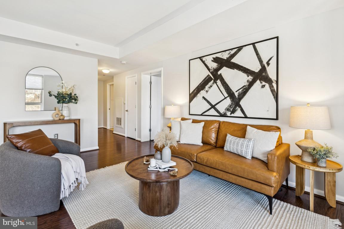 355 I Street Southwest, Unit 501 Washington, DC 20024 - Photo 5 of 44 a living room with furniture and a potted plant