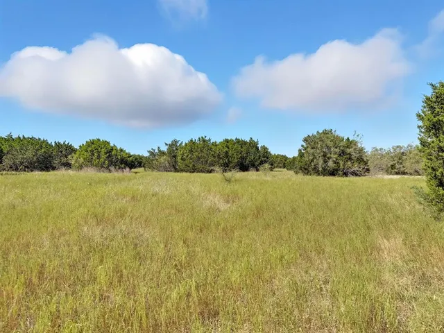 a view of a lake and mountain in the back
