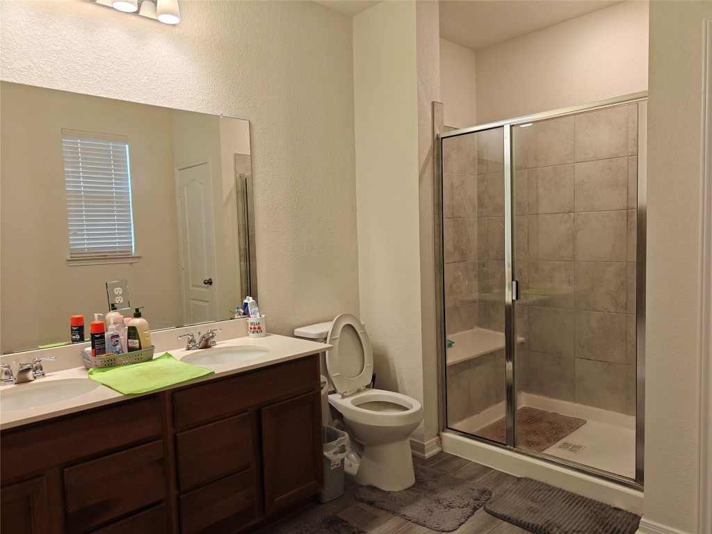 1270 Glendora Drive Rosharon, TX 77583 - Photo 11 of 43 a bathroom with a sink toilet and shower