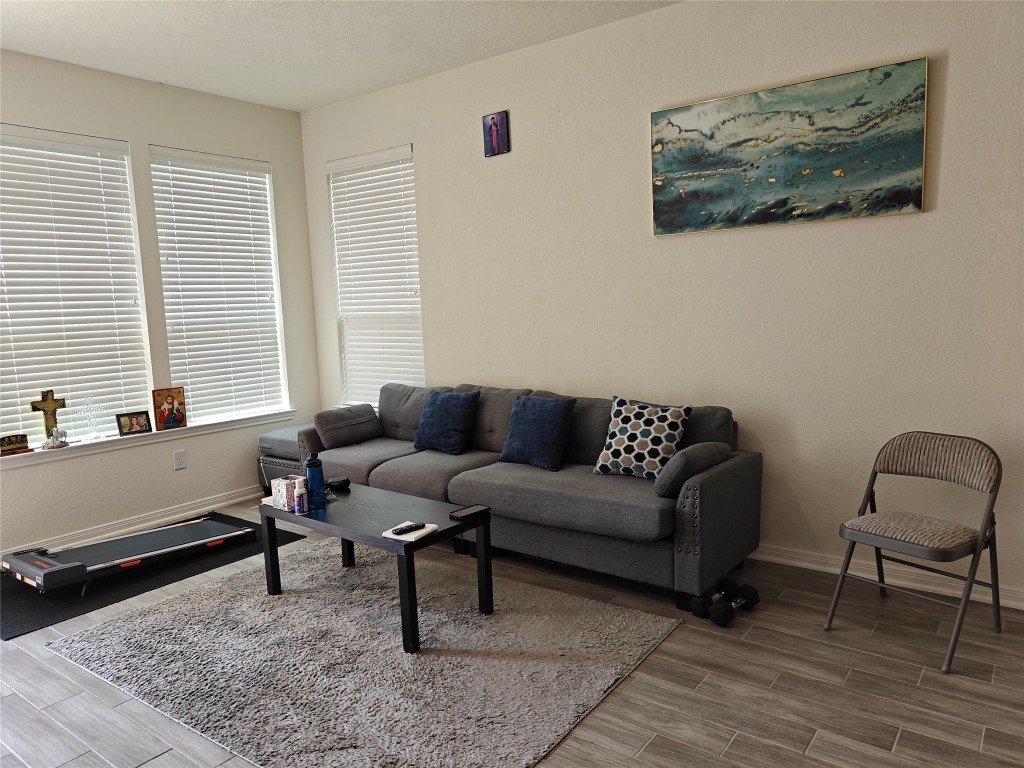 1270 Glendora Drive Rosharon, TX 77583 - Photo 16 of 43 a living room with furniture and a window