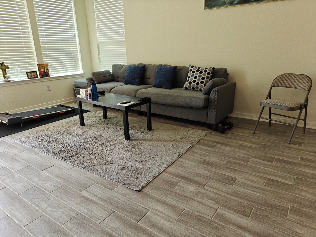 1270 Glendora Drive Rosharon, TX 77583 - Photo 17 of 43 a living room with furniture and a rug