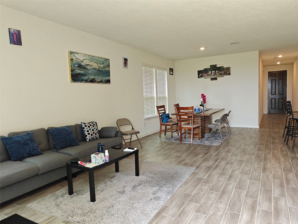 1270 Glendora Drive Rosharon, TX 77583 - Photo 19 of 43 a living room with furniture and wooden floor