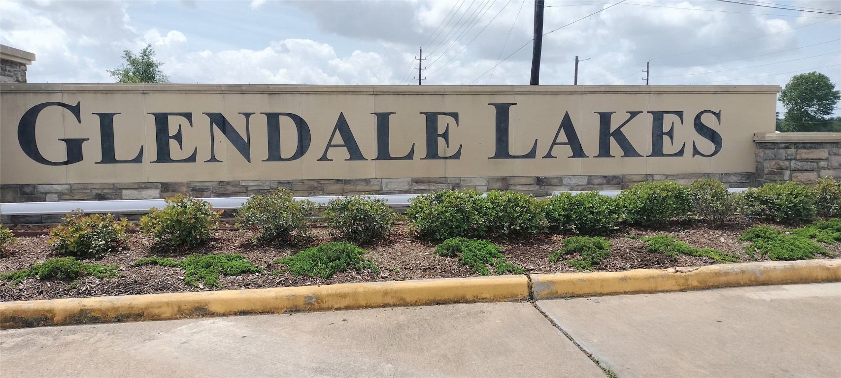 1270 Glendora Drive Rosharon, TX 77583 - Photo 2 of 43 a view of outdoor space with signage and flags