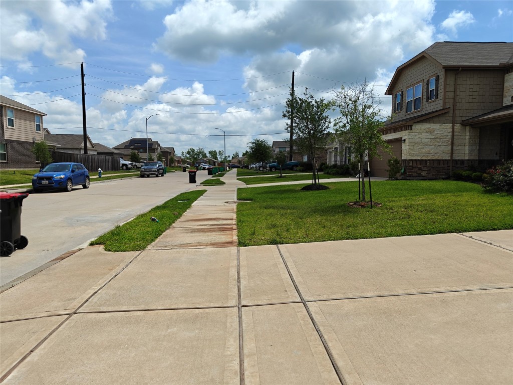 1270 Glendora Drive Rosharon, TX 77583 - Photo 3 of 43 a view of a street with houses on both side