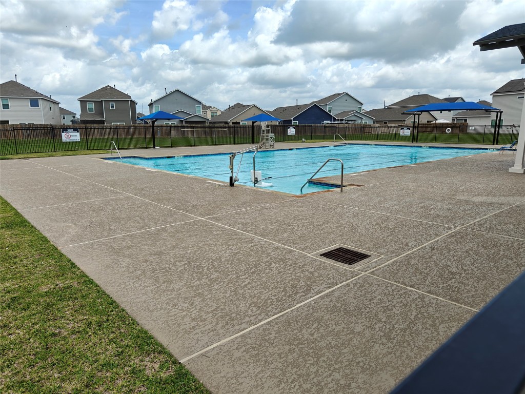 1270 Glendora Drive Rosharon, TX 77583 - Photo 31 of 43 a view of an outdoor space with a garden and fire pit