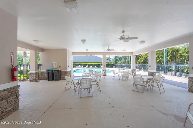 a view of a house with swimming pool