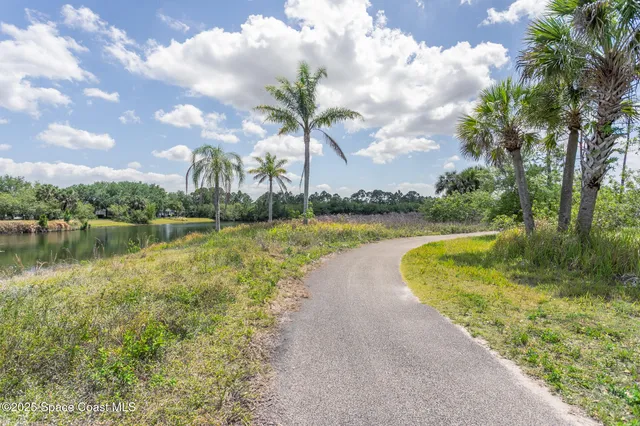 an aerial view of a house with outdoor space