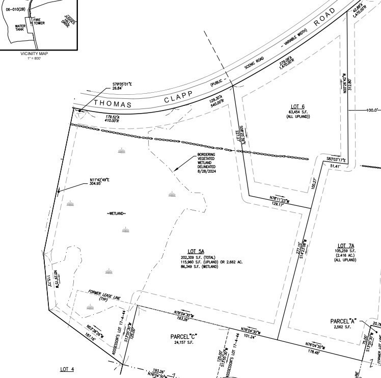 453-455 Clapp Road Scituate, MA 02066 - Photo 2 of 5 a picture of a room with a white house and wooden floor