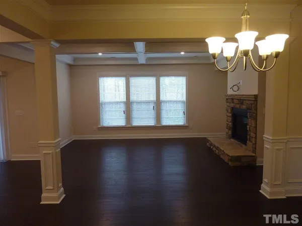 a view of a livingroom with wooden floor
