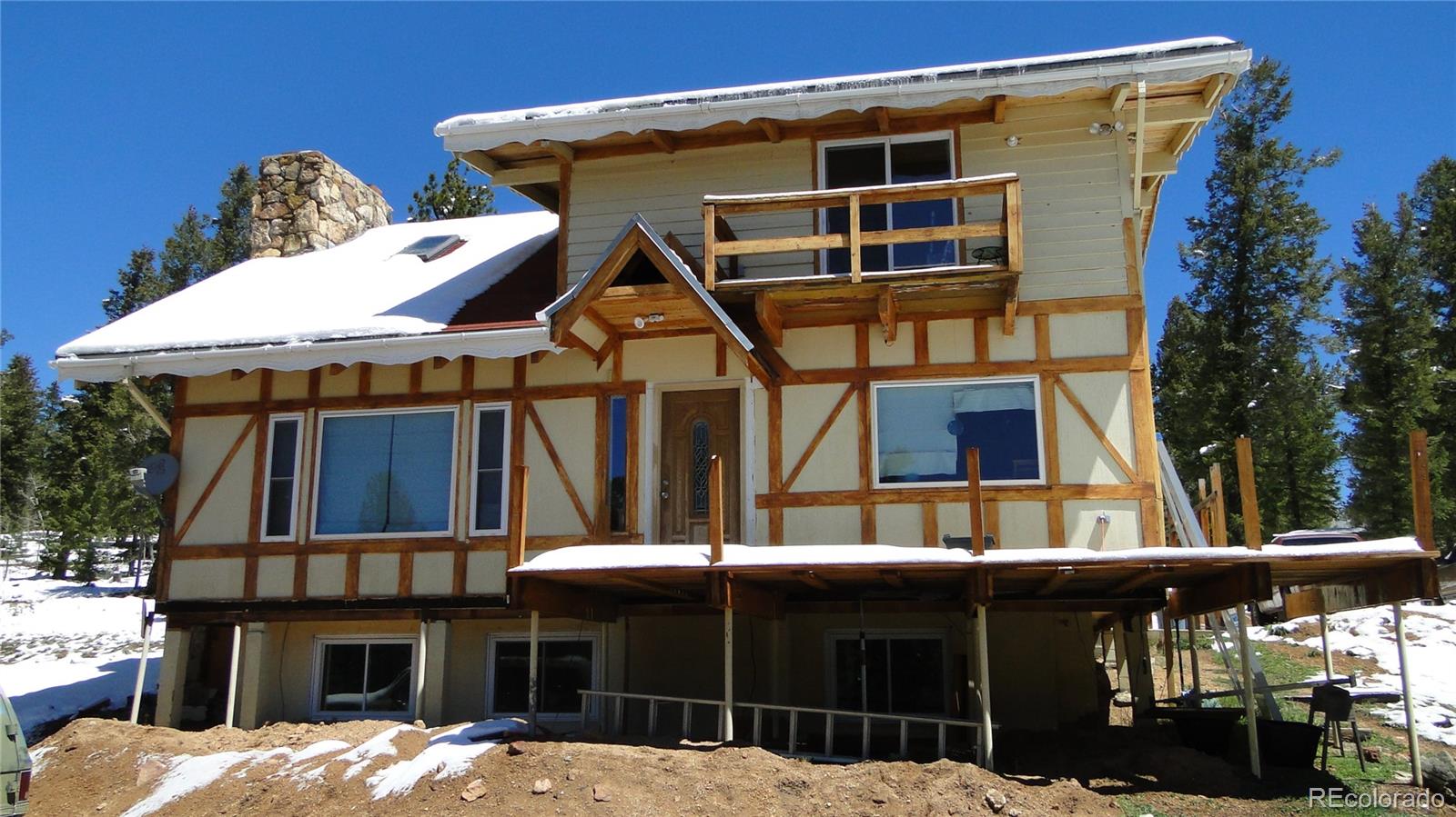 600 Forest Drive Bailey, CO 80421 - Photo 2 of 8 a view of a house with roof deck