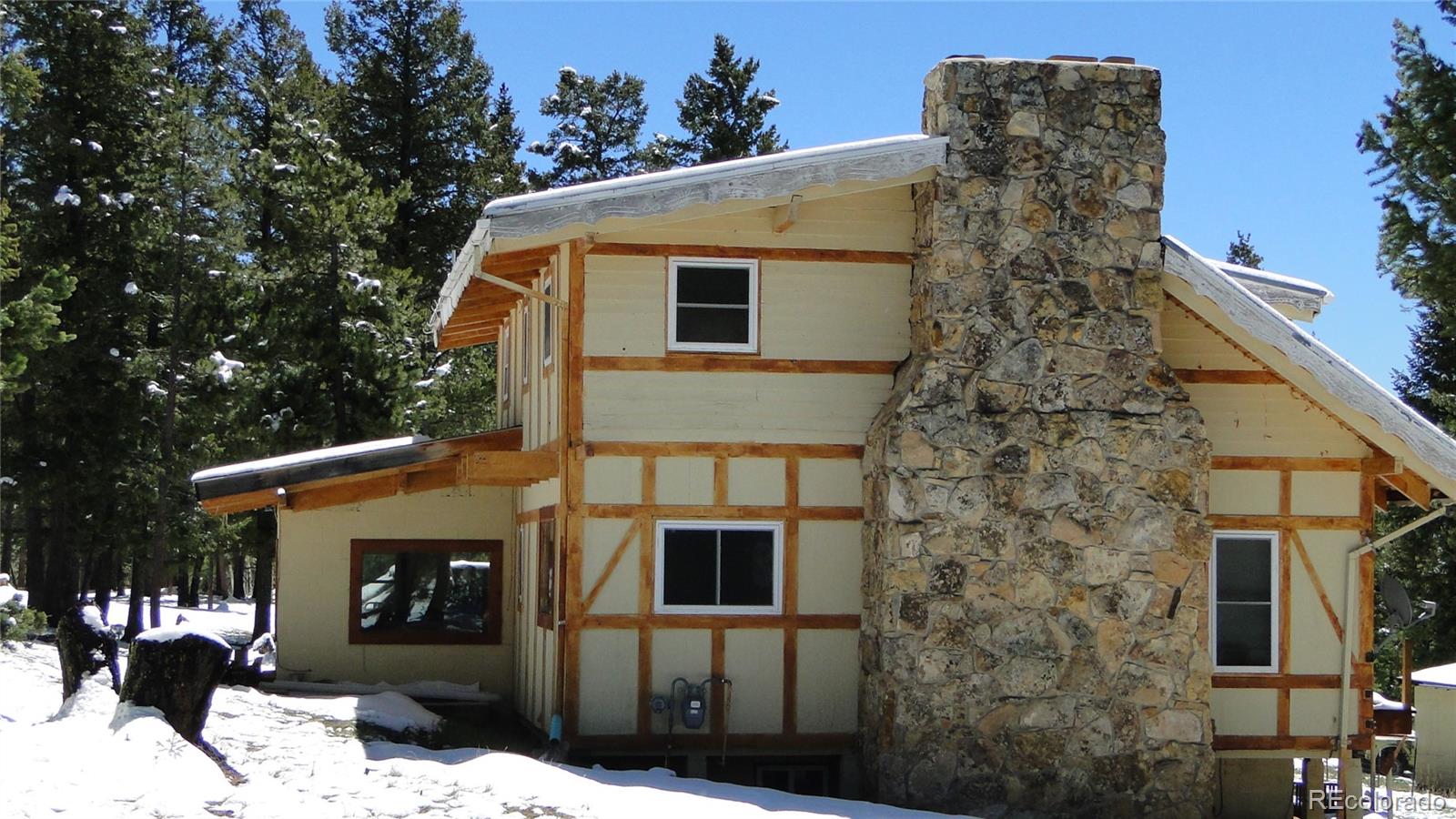 600 Forest Drive Bailey, CO 80421 - Photo 8 of 8 a front view of a house with yard