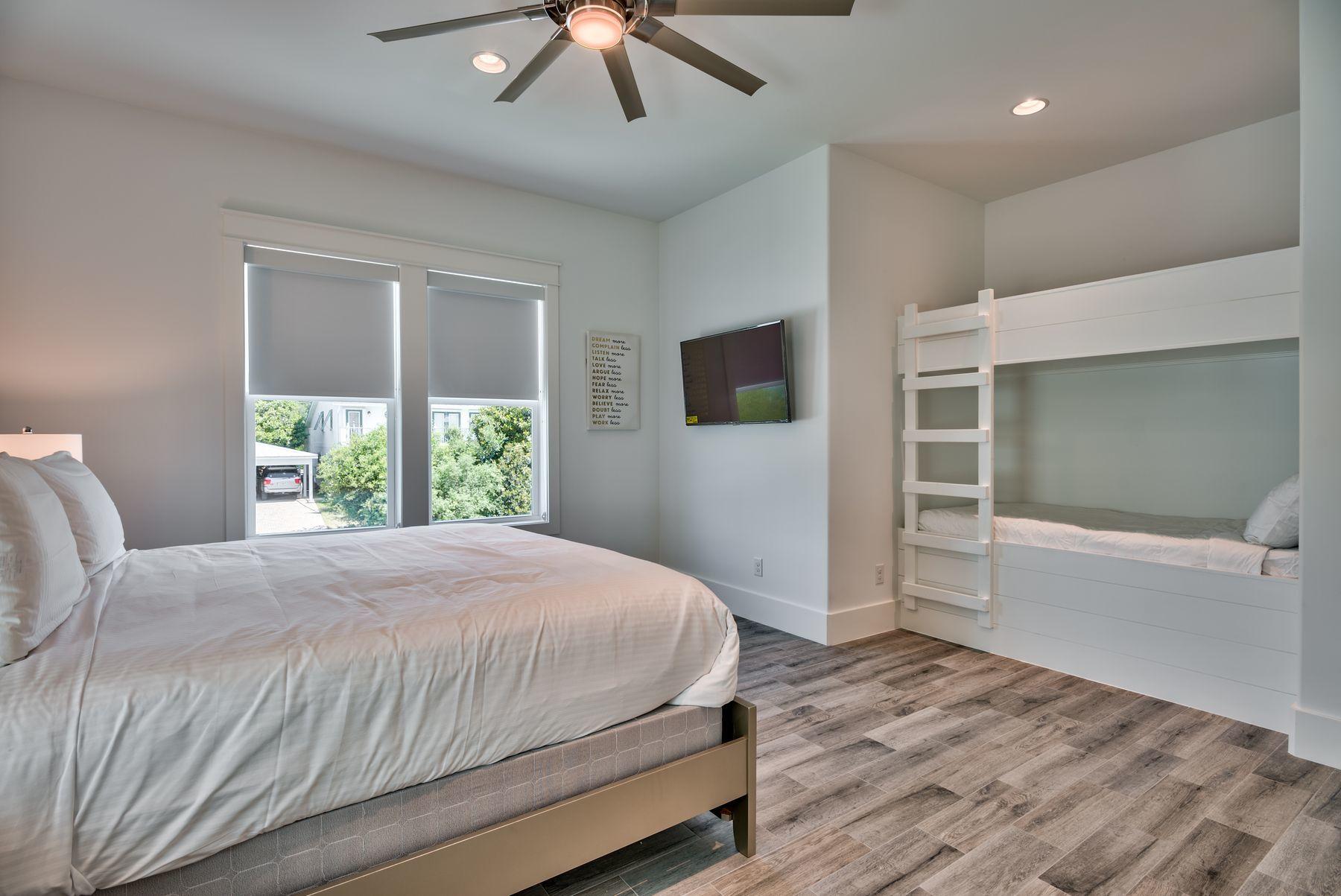 37 West Seahorse Circle Santa Rosa Beach, FL 32459 - Photo 23 of 44 a bedroom with a large bed and a window