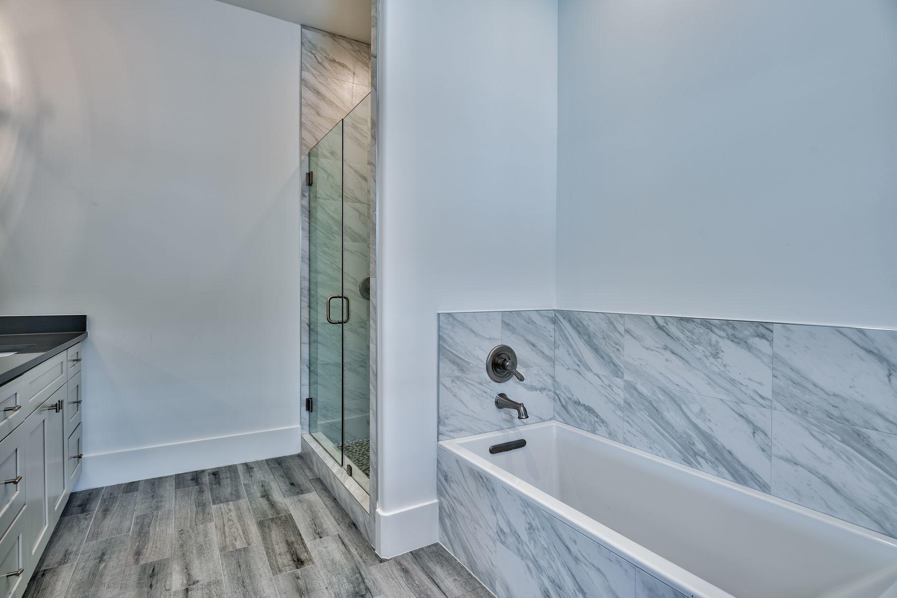 37 West Seahorse Circle Santa Rosa Beach, FL 32459 - Photo 29 of 44 a bathroom with a bathtub and shower