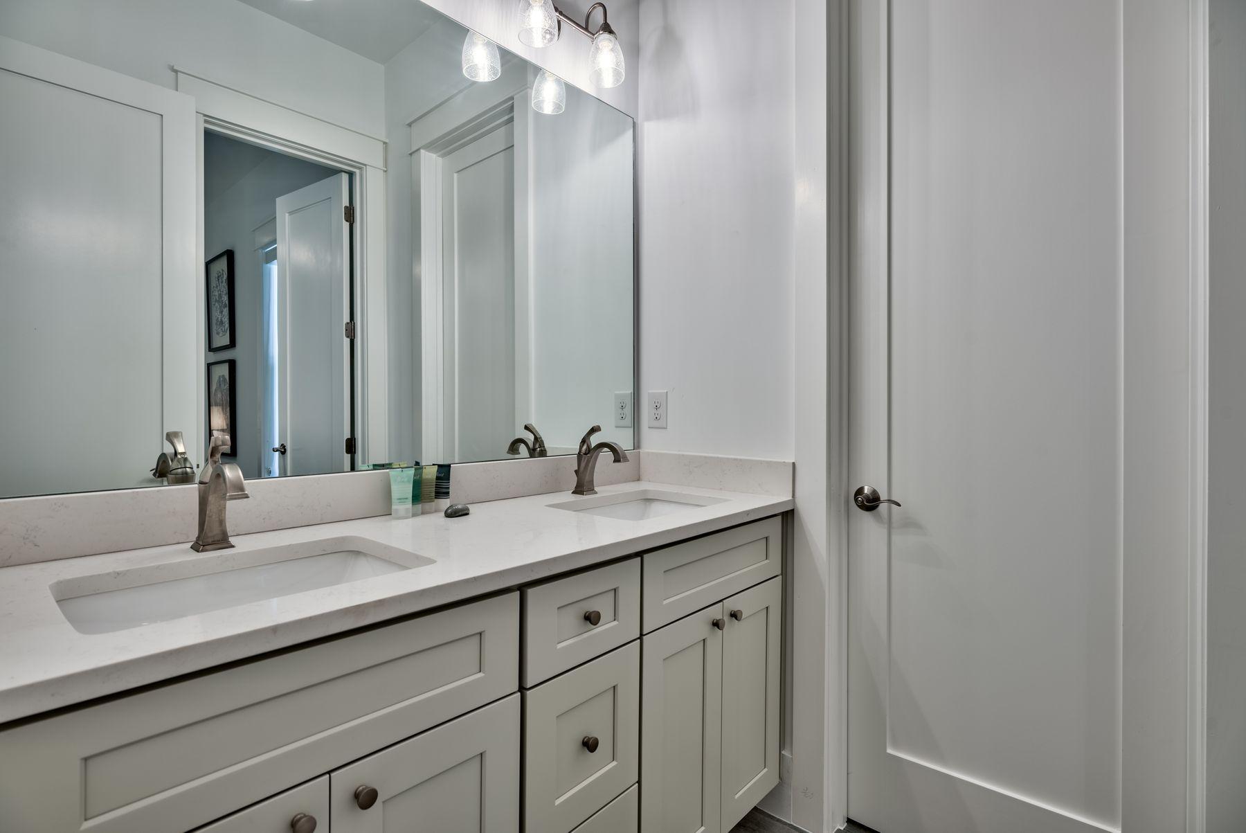 37 West Seahorse Circle Santa Rosa Beach, FL 32459 - Photo 33 of 44 a bathroom with a sink and a mirror