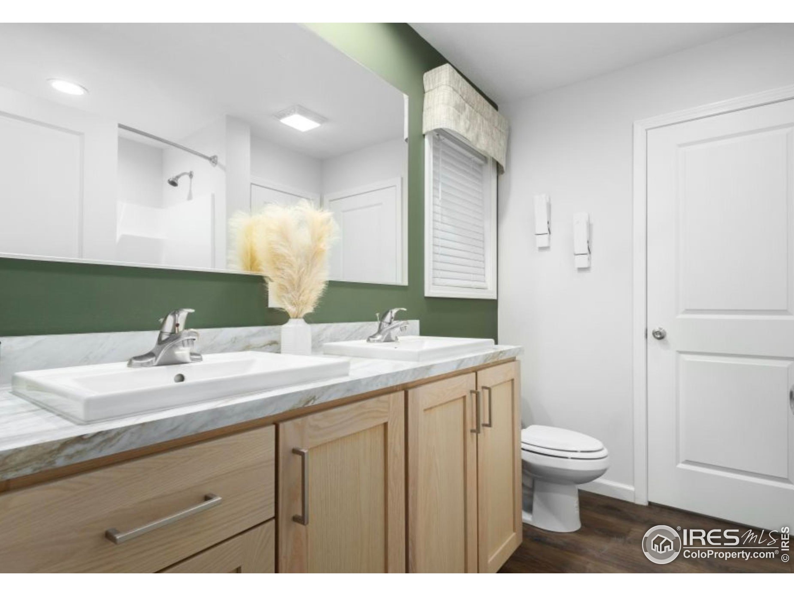 0 3rd Street Carr, CO 80612 - Photo 6 of 8 a bathroom with a sink a toilet and a mirror