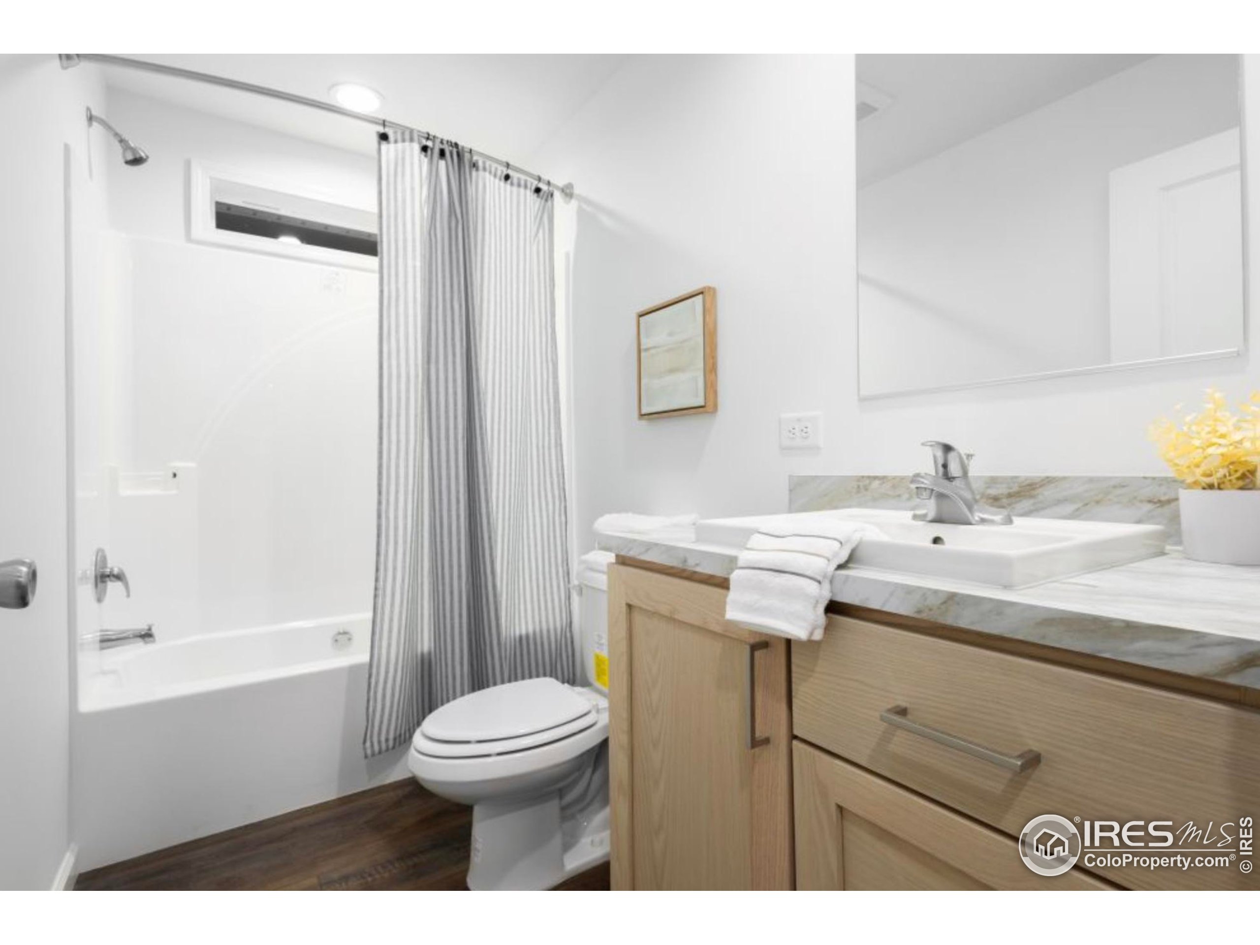 0 3rd Street Carr, CO 80612 - Photo 7 of 8 a bathroom with a sink a toilet and shower