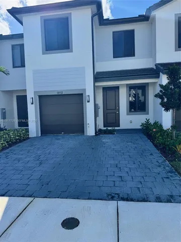 a view of a yard of a house