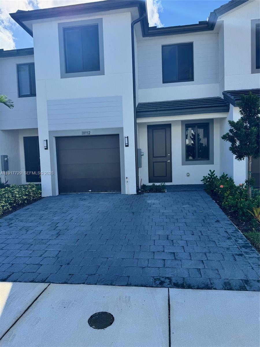 18948 Southwest 344th Terrace, Unit 18948 Homestead, FL 33034 - Photo 2 of 17 a view of a yard of a house