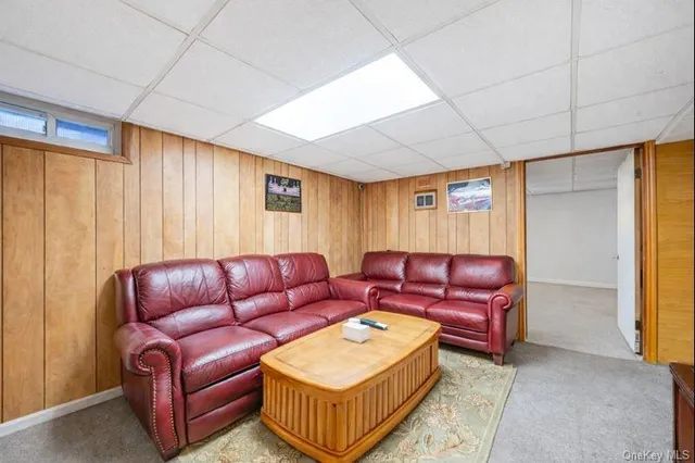 a work room with furniture and a window