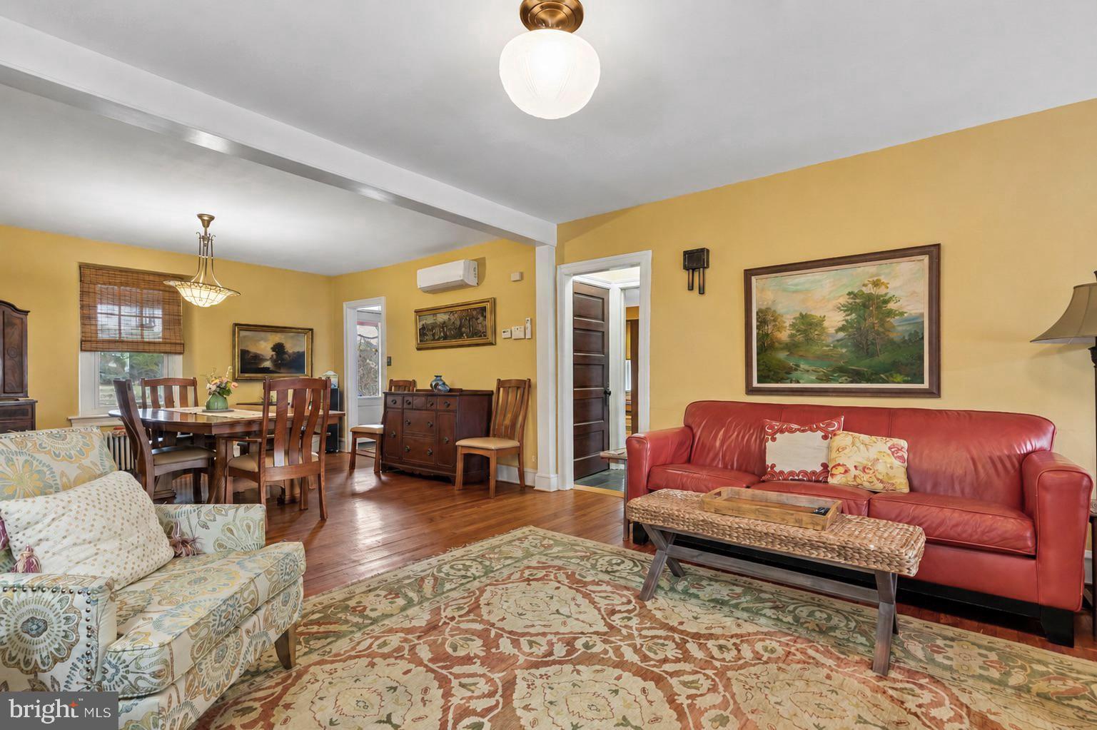 75 Morris Road Harleysville, PA 19438 - Photo 5 of 68 a living room with furniture couch and wooden floor