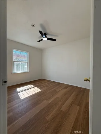 a view of an empty room and window
