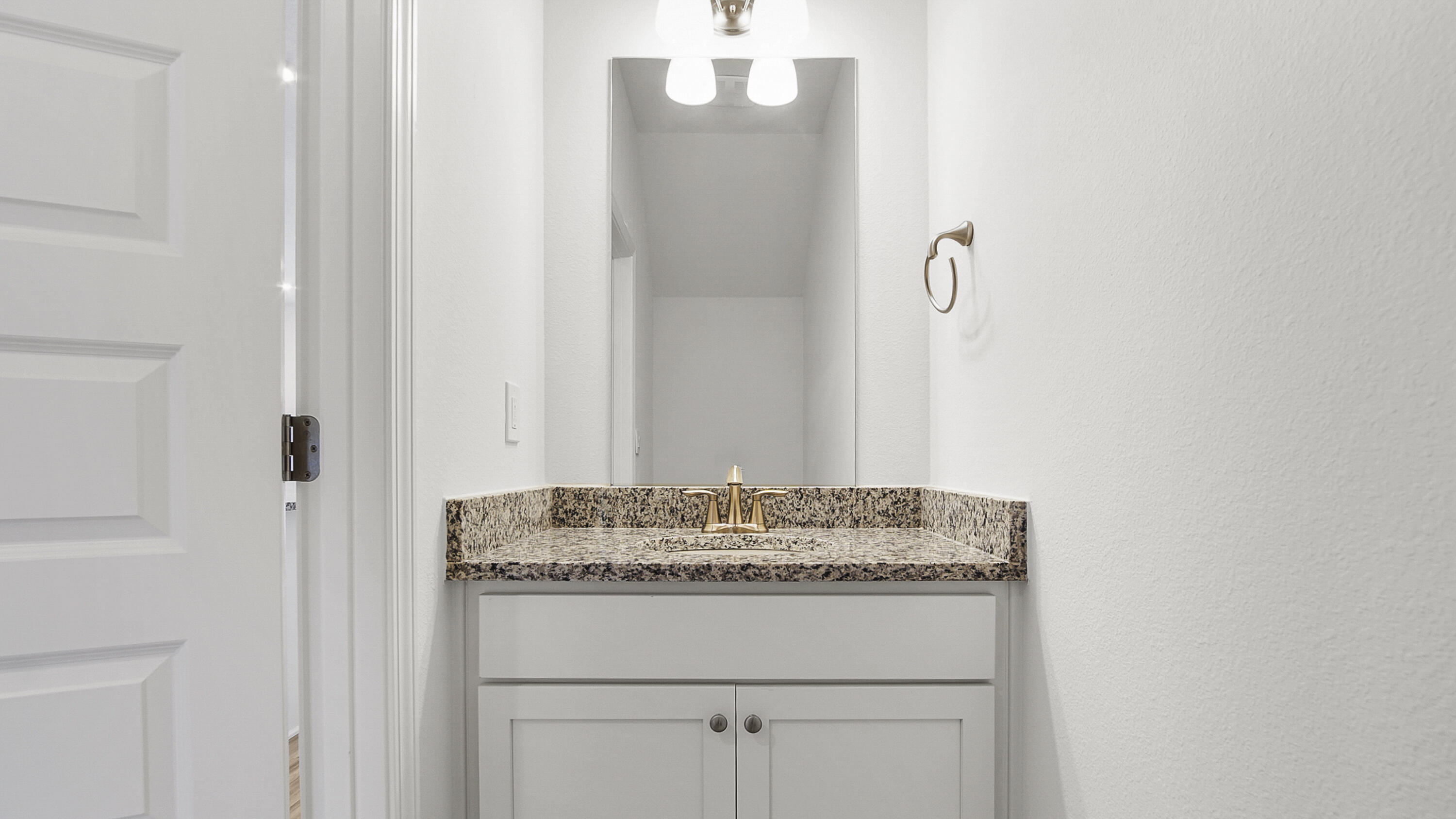 55 Phoenix Street Santa Rosa Beach, FL 32459 - Photo 16 of 34 a bathroom with a granite countertop sink and a mirror
